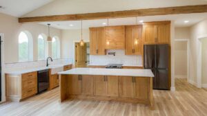 Warm wood kitchen with modern touches built by Dylan Bauguess Construction
