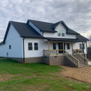 Beautiful home exterior and front porch designed and built by Dylan Bauguess Construction