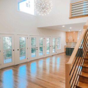 Natural light flooding open living room in new home addition