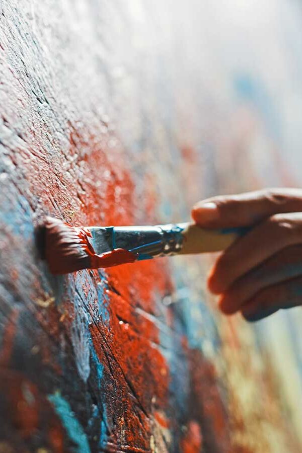 artist painting on canvas edited