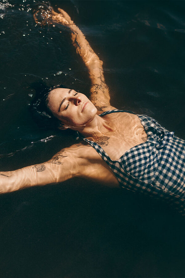 woman floating in lake edited